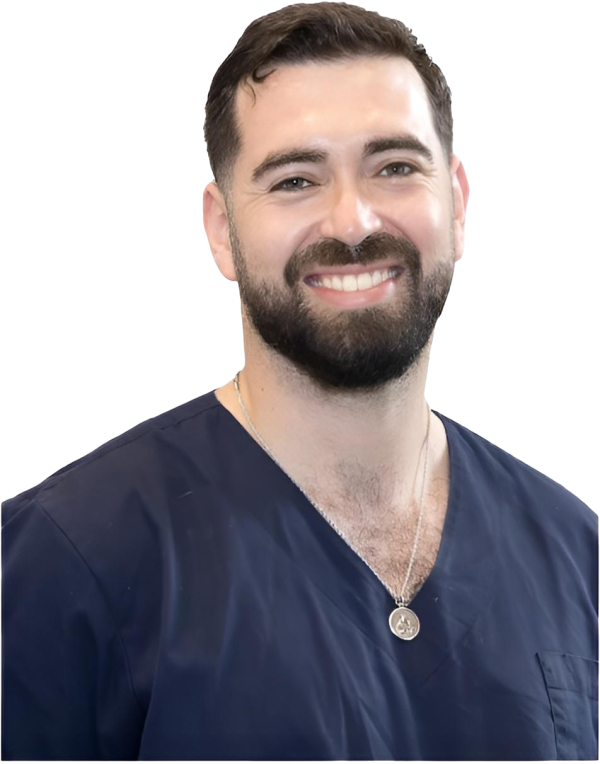 Smiling portrait of Dr. Frank Poppolo, general and cosmetic dentist in Toronto.