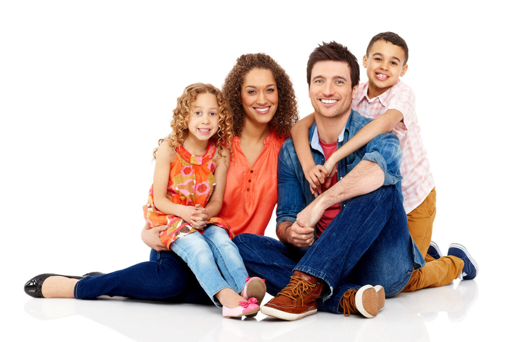 Portrait of cute little family sitting together on white background
